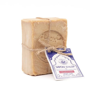 Potager Soap Co. traditional Aleppo soap bar made with olive and bay laurel oil, tied with twine and a paper tag.