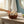 Potager Soap Co. artisan bath gift basket with handcrafted soaps, bamboo brush, and dried lavender in a woven basket.