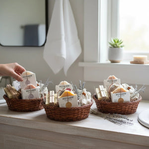 Potager Soap Co. artisan bath gift baskets with handcrafted soaps, bamboo brushes, and dried lavender in woven baskets.