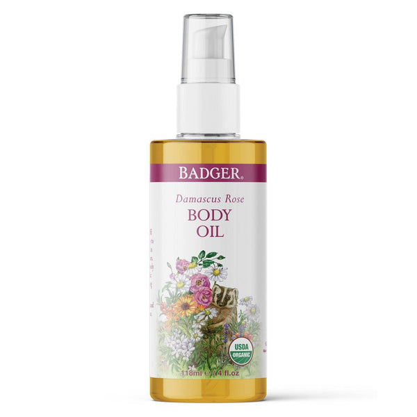 Potager Soap Co. Badger Damascus Rose body oil in a clear pump bottle with floral and badger illustration