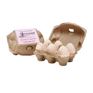 Potager Soap Co. Secret Garden egg-shaped bath bombs in a sustainable recycled paper carton for a spa-like soak.