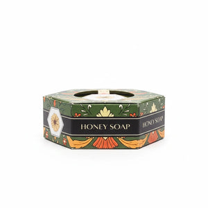 Potager Soap Co. BAUDELAIRE Calendula Honey Soap in a decorative green hexagonal box with floral illustrations.
