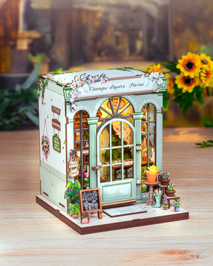 Potager Soap Co. Champs-Élysées Florist DIY book nook kit featuring a miniature pastel flower shop with LED lighting.