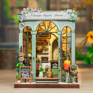 Potager Soap Co. Champs-Élysées Florist miniature DIY book nook kit with pastel floral shop details and LED lighting.