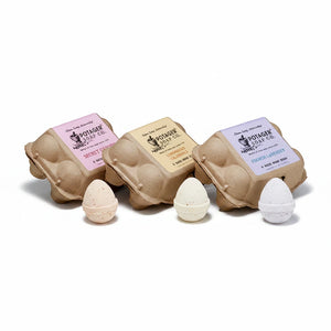 Potager Soap Co. bath bomb eggs in recycled paper cartons with Secret Garden, Lemongrass Calendula, and French Lavender.