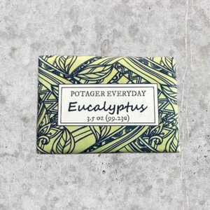 Potager Soap Co. Eucalyptus Everyday bar soap in a decorative yellow and green botanical patterned paper wrapper.