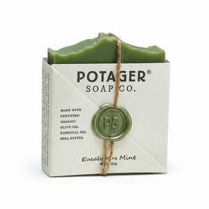 Potager Soap Co. Eucalyptus Mint bar soap in white paper packaging with a green wax seal and twine tie.