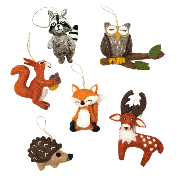 Potager Soap Co. handmade felt forest animal ornaments including a raccoon, owl, squirrel, fox, hedgehog, and deer.