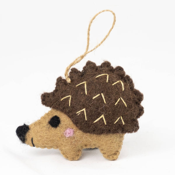 Potager Soap Co. handmade felt hedgehog ornament in brown and tan wool with embroidered quill details and twine loop.