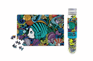 Potager Soap Co. Fish Doodle 150-piece micro jigsaw puzzle featuring colorful oceanic creatures in a clear tube.