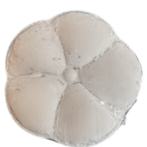 Potager Soap Co. flower-shaped bath bomb in off-white, crafted with organic botanicals and moisturizing coconut oil.