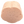 Potager Soap Co. flower-shaped bath bomb in a soft pink hue with visible organic botanical inclusions.