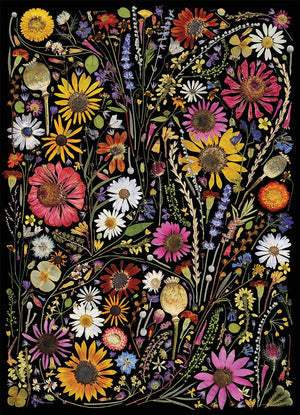 Potager Soap Co. 1000-piece jigsaw puzzle featuring a vibrant arrangement of pressed wildflowers on a black background.