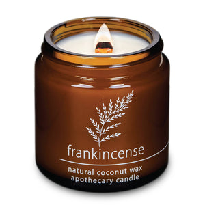 Potager Soap Co. HEMLOCK PARK frankincense scented candle in an amber glass apothecary jar with a natural wood wick.