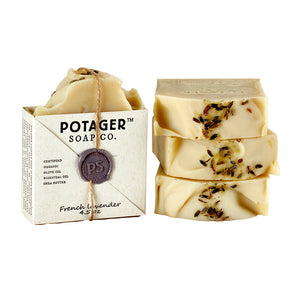 Potager Soap Co. French Lavender organic bar soap with visible lavender buds and rustic wax-sealed paper packaging.