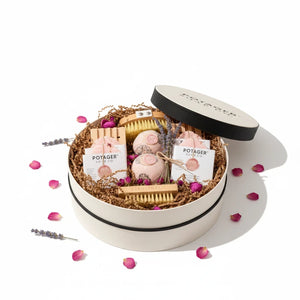 Potager Soap Co. handcrafted gift set in a white linen hat box with soaps, bath bombs, and natural brushes.