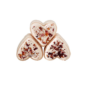 Potager Soap Co. heart-shaped botanical bath bombs topped with dried flower petals for a luxurious floral spa experience
