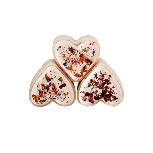 Potager Soap Co. heart-shaped botanical bath bombs topped with dried flower petals for a luxurious floral spa experience