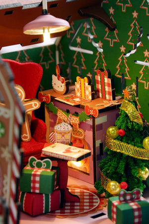 Potager Soap Co. Hello Kitty wooden gingerbread house DIY kit interior with festive Christmas tree and fireplace
