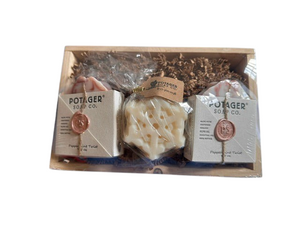 Potager Soap Co. holiday gift set featuring two organic soap bars and a snowflake soap in a rustic wooden tray.