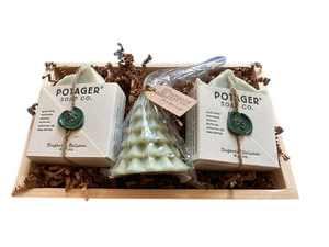 Potager Soap Co. holiday gift set with two organic soap bars and a tree-shaped soap in a rustic wooden tray.