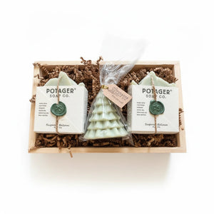Potager Soap Co. holiday gift set with two organic soap bars and a tree-shaped soap in a rustic wooden tray.