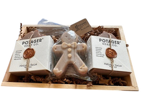 Potager Soap Co. holiday gift set featuring two organic soap bars and a gingerbread man soap in a rustic wood tray.