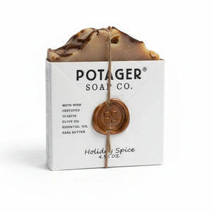Potager Soap Co. Holiday Spice organic bar soap wrapped in white paper with a rustic wax seal and twine.