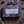 Potager Soap Co. Everyday Lavender bar soap in purple patterned paper packaging surrounded by fresh lavender sprigs.