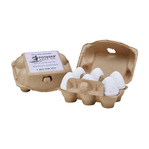 Potager Soap Co. French Lavender bath bomb eggs in a rustic recycled paper carton for a spa-like bath experience.