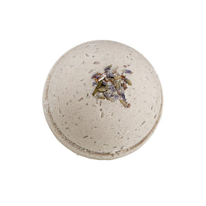 Potager Soap Co. lavender bath bomb with dried botanical flowers on a white background
