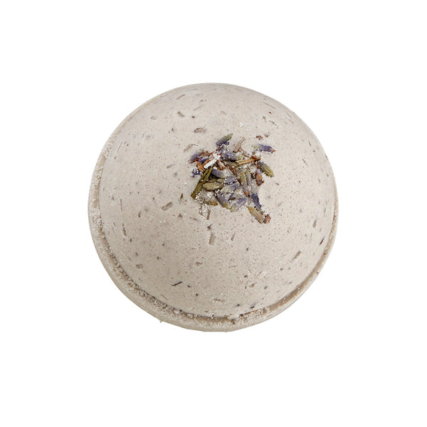 Potager Soap Co. lavender bath bomb with dried botanical flowers on a white background