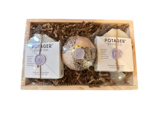 Potager Soap Co. artisan gift set featuring two French Lavender soap bars and a bath bomb in a rustic wooden crate.