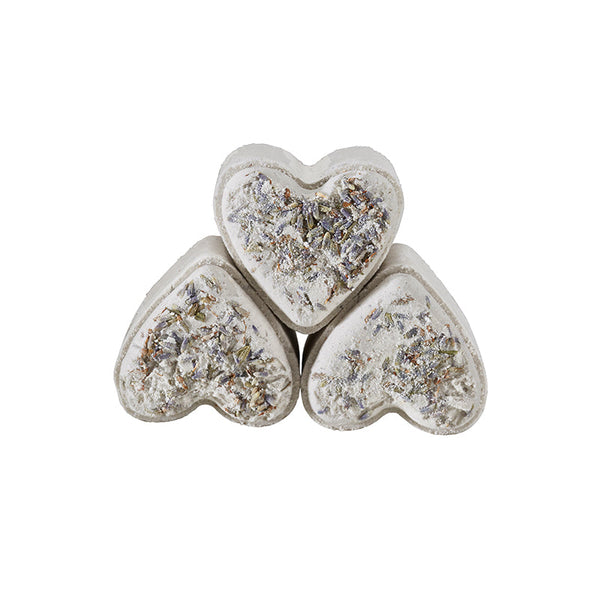 Potager Soap Co. heart-shaped bath bombs topped with dried organic lavender flowers on a white background