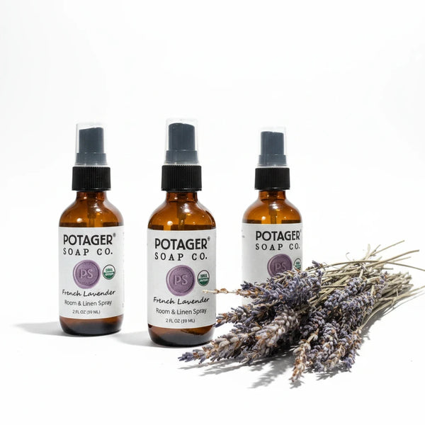 Potager Soap Co. French Lavender room and linen spray in amber glass bottles with dried lavender sprigs.