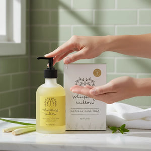 Potager Soap Co. Whispering Willow lemongrass hand soap in a glass bottle with pump dispenser and matching box.
