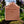 Potager Soap Co. Secret Garden organic castile soap bar with dried flower petals on a mossy stone in a garden