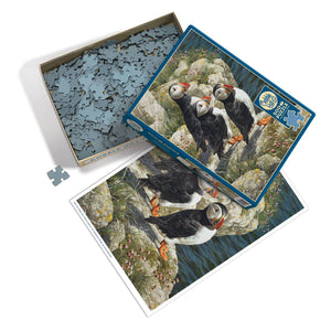 Potager Soap Co. Cobble Hill Fisherman's Wharf 500-piece jigsaw puzzle with puffin illustration and reference poster.