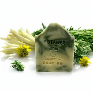 Potager Soap Co. Rosemary Lemongrass artisan soap bar with green clay swirls, fresh rosemary, and lemongrass stalks.