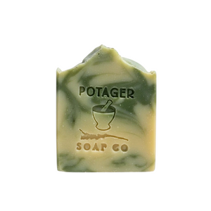 Potager Soap Co. rosemary lemongrass artisan bar soap with green clay swirls and embossed logo on white background