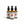 Three Potager Soap Co. Secret Garden room and linen spray bottles in amber glass with black spray nozzles.