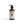 Potager Soap Co. Secret Garden hand and body lotion in an amber glass bottle with a black pump dispenser.