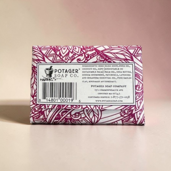Back of Potager Soap Co. Secret Garden bar soap packaging featuring botanical patterns and ingredient information.