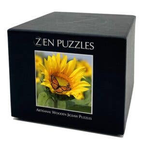 Potager Soap Co. ZEN PUZZLES wooden jigsaw puzzle box featuring a vibrant sunflower and monarch butterfly image