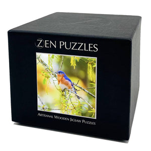 Potager Soap Co. ZEN PUZZLES wooden jigsaw puzzle box featuring a vibrant bluebird on a branch