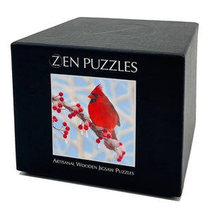 Potager Soap Co. Zen Puzzles Winter Cardinal wooden jigsaw puzzle box featuring a red bird on a snowy branch.